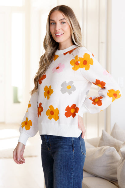 Stay comfortable and warm in our "Falling Flowers Floral Sweater". This medium weight sweater adorns adorable flowers for a charmingly cute touch. With the ribbed neckline, sleeve cuff, and hem, this sweater is a must-have for any fashion-forward individual. S -3X