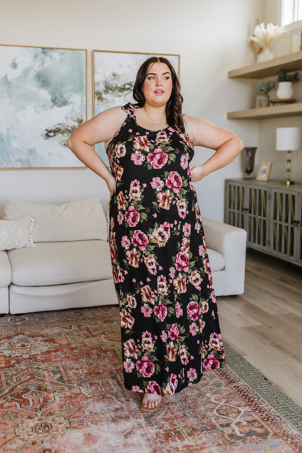 Be picture-perfect in this Fortuitous Floral Maxi dress. Its lightweight jersey knit fabric flatters your figure, while the adjustable drawstring back and functional tie offer an elegant touch. Plus, the large scale floral print looks vibrant and eye-catching. Let your style blossom! S - 3X