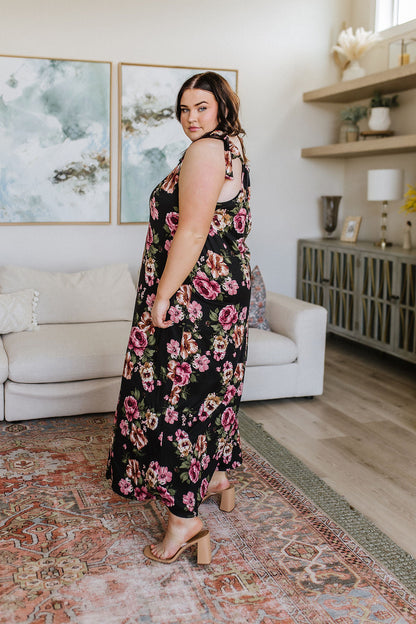 Be picture-perfect in this Fortuitous Floral Maxi dress. Its lightweight jersey knit fabric flatters your figure, while the adjustable drawstring back and functional tie offer an elegant touch. Plus, the large scale floral print looks vibrant and eye-catching. Let your style blossom! S - 3X