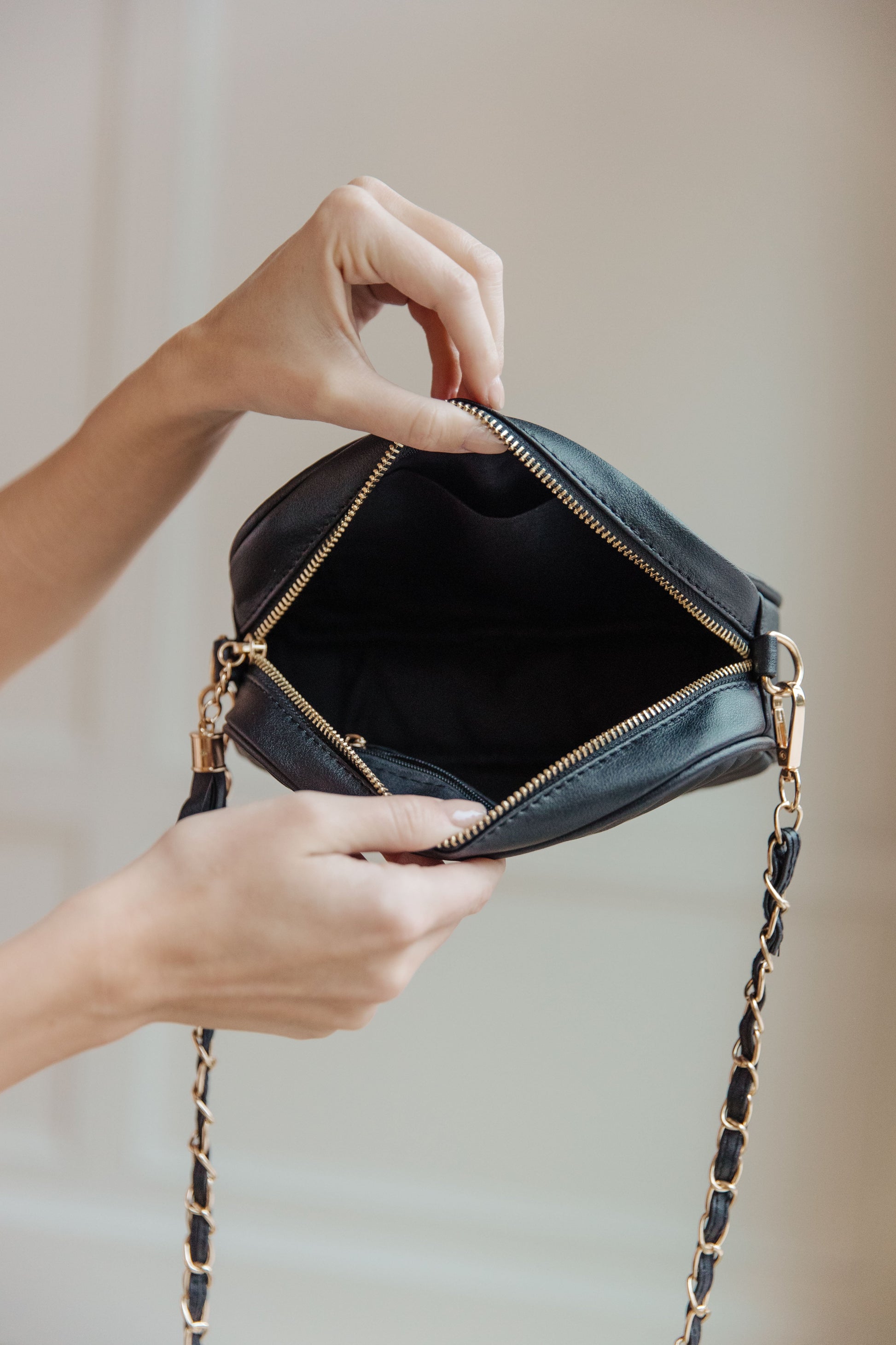 Make your style statement with the Get What You Need Crossbody. Crafted with quilted vegan leather and gold accents, it features a gold chain strap and tassel zipper for easy access. Plus, it has an inside zipper envelope pocket and open pocket on the opposite side. Look polished, keep what you need!