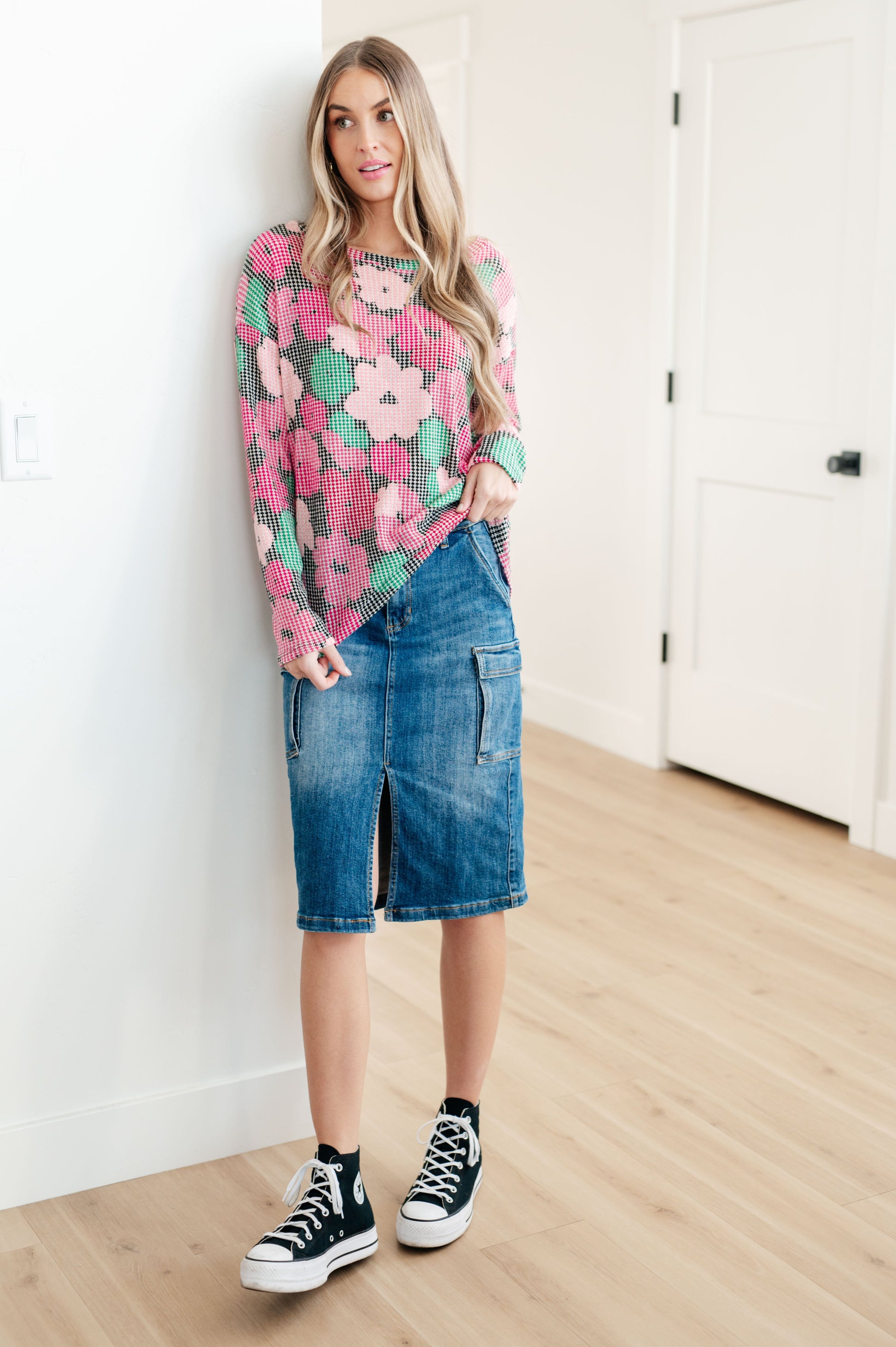 This stylish Always Be There Cargo Denim Skirt is the perfect piece for everyday wear. It's crafted with stretchy medium wash denim for a comfortable fit and extra movement, and features a front slit and cargo pockets for a more dynamic look. Look great and put your most fashionable foot forward! S - 3X