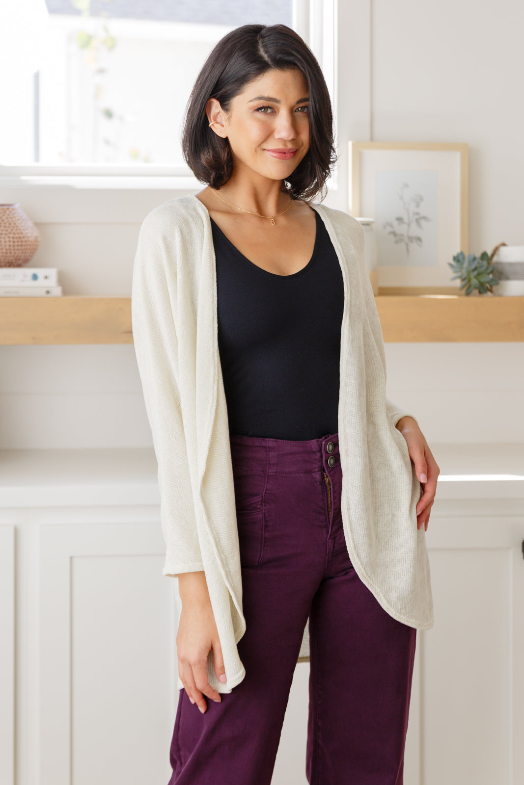 Make a statement in the How's It Going Open Front Cardigan. Crafted with lightweight sweater knit fabric for a classic look, this cardigan features a fluid open-front design and long, dolman sleeves with curved hem. Feel the freedom of unrestricted mobility and unparalleled style, all-in-one. S - 3X