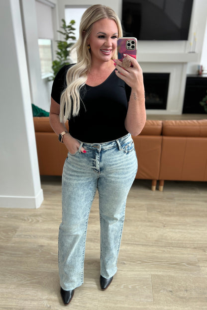 Get ready to elevate your denim game with our Dory High Waist Mineral Wash Raw Hem Wide Leg Jeans from Judy Blue. Designed for comfort with 4-way stretch and a high rise waist, these jeans will give you the perfect fit every time. The mineral wash and raw hem add a touch of style for a versatile and on-trend look 0 -24W