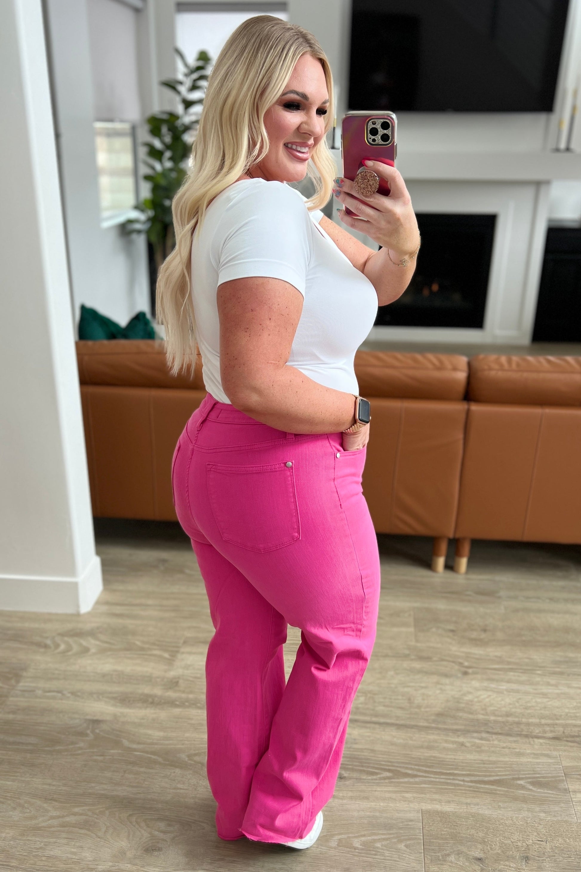  The bright pink garment dye adds a fun pop of color, and the adorable pink heart embroidered on the back pocket adds a touch of charm. Finished with a raw hem for an effortlessly cool look. Elevate your denim game with these must-have jeans.  Judy Blue 0 -24W