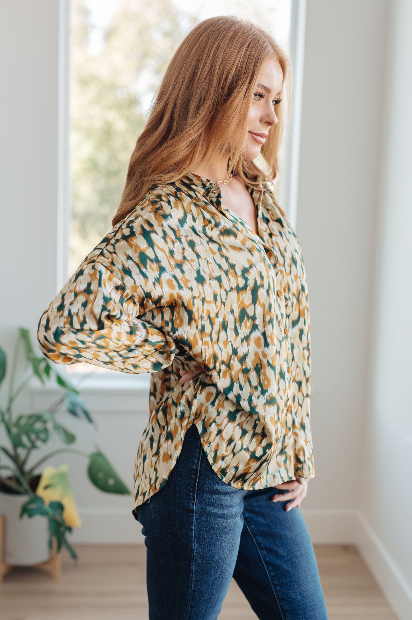 Introducing the In the Willows Button Up Blouse: created from luxurious poly satin for a stunning look that will have you feeling as confident as ever. This beautiful blouse features a collared neckline, button front fastening, and buttoned sleeve cuffs. With an elegant abstract print, this blouse will give you the perfect mix of modern and timeless style.
