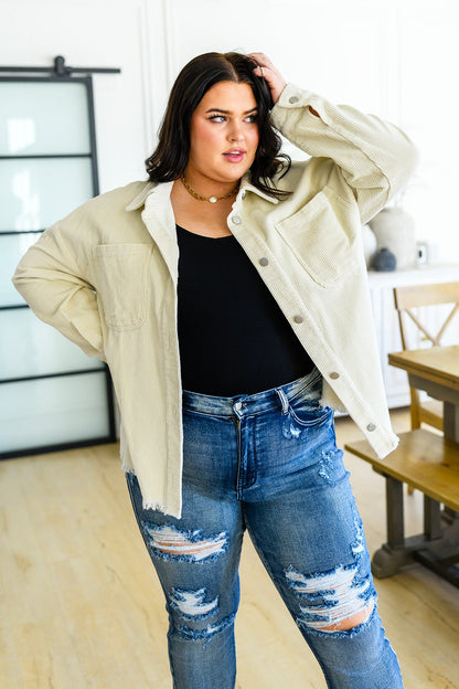 Make your mornings a little easier with versatile pieces like the Invested In You Corduroy Shacket! This shirt-meets-jacket features a lightweight corduroy shaping a collared neckline that falls into a functional button front. Slouchy long sleeves frame the slightly cropped bodice, that boasts a frayed hem and chest patch pocket.S - 3X