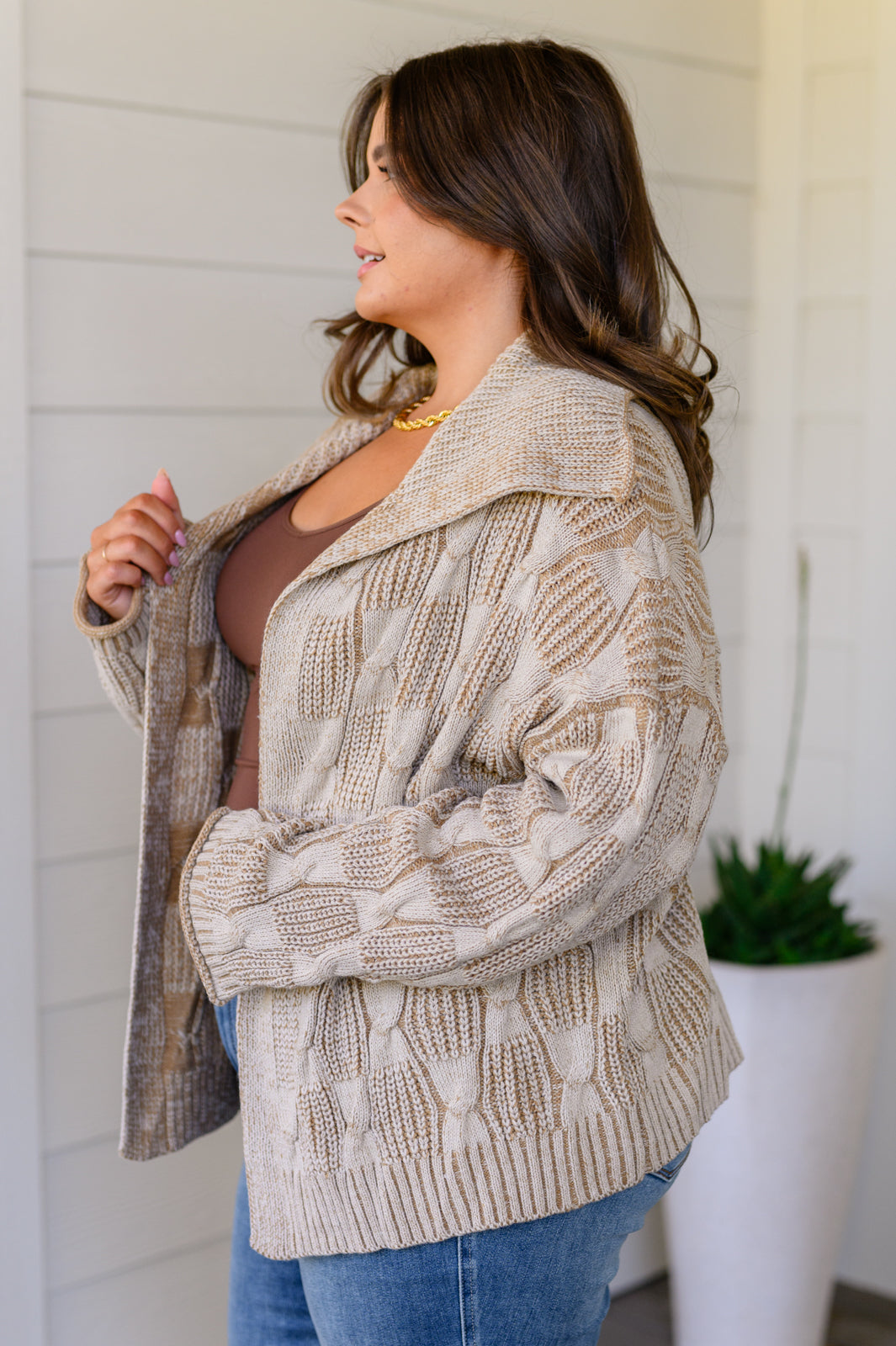 Make a stunning fashion statement with the Look Out World Open Front Cardigan! Its cable knit checkered pattern creates an eye-catching design, while its ribbed shawl collar and open front make this cardigan perfect for those cooler evenings. The soft feel is sure to be a favorite, making it the perfect addition to your style! S - 3X