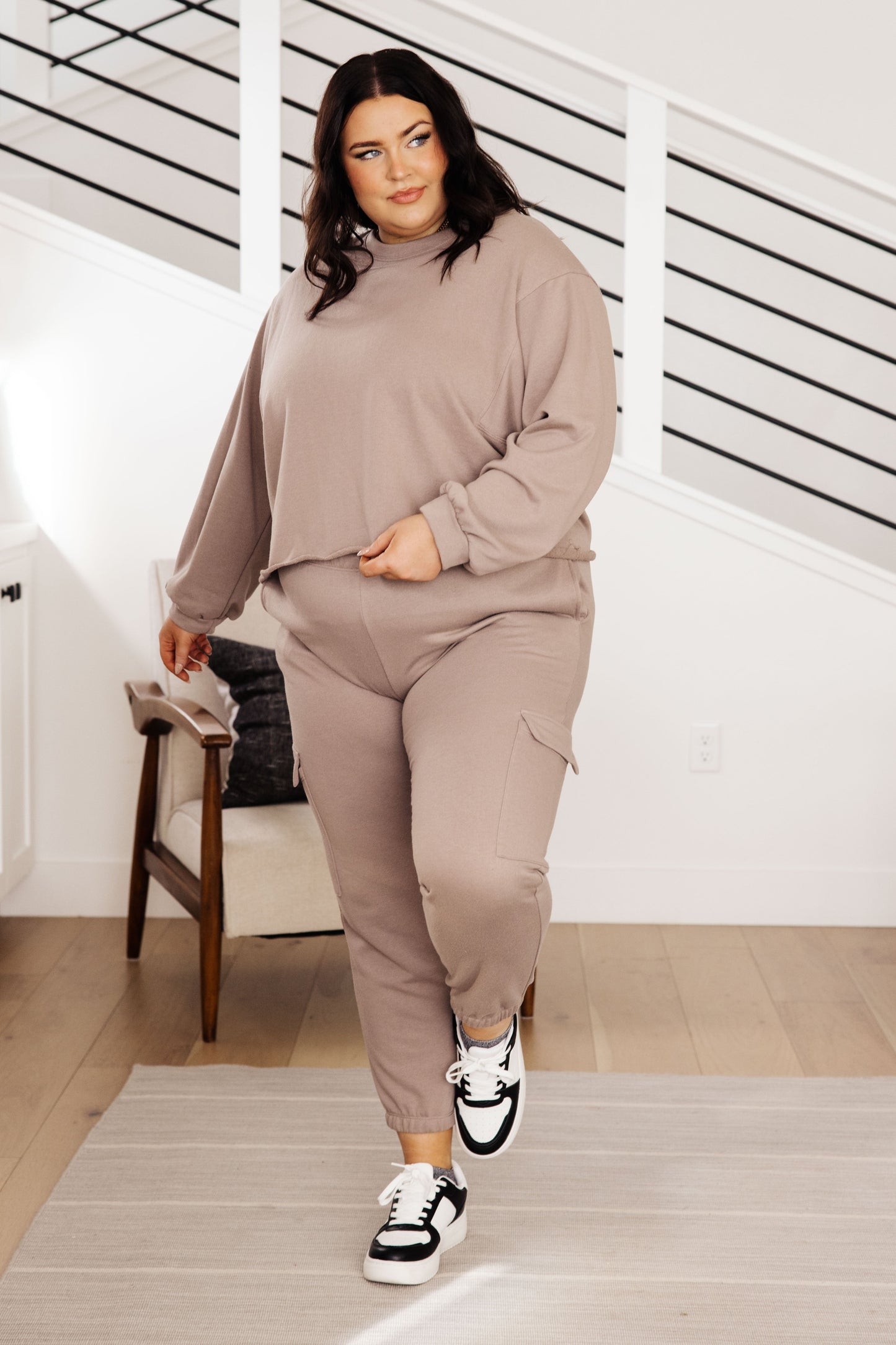 The Lounge A Lot Cut Off Sweatshirt is the perfect piece for weekend lounging. Crafted from lightweight french terry, it's designed with a crew neck, dropped shoulder, and a relaxed fit. The cut off hem allows for maximum comfort, while the matching pants provide the perfect lounge fit. S - XL