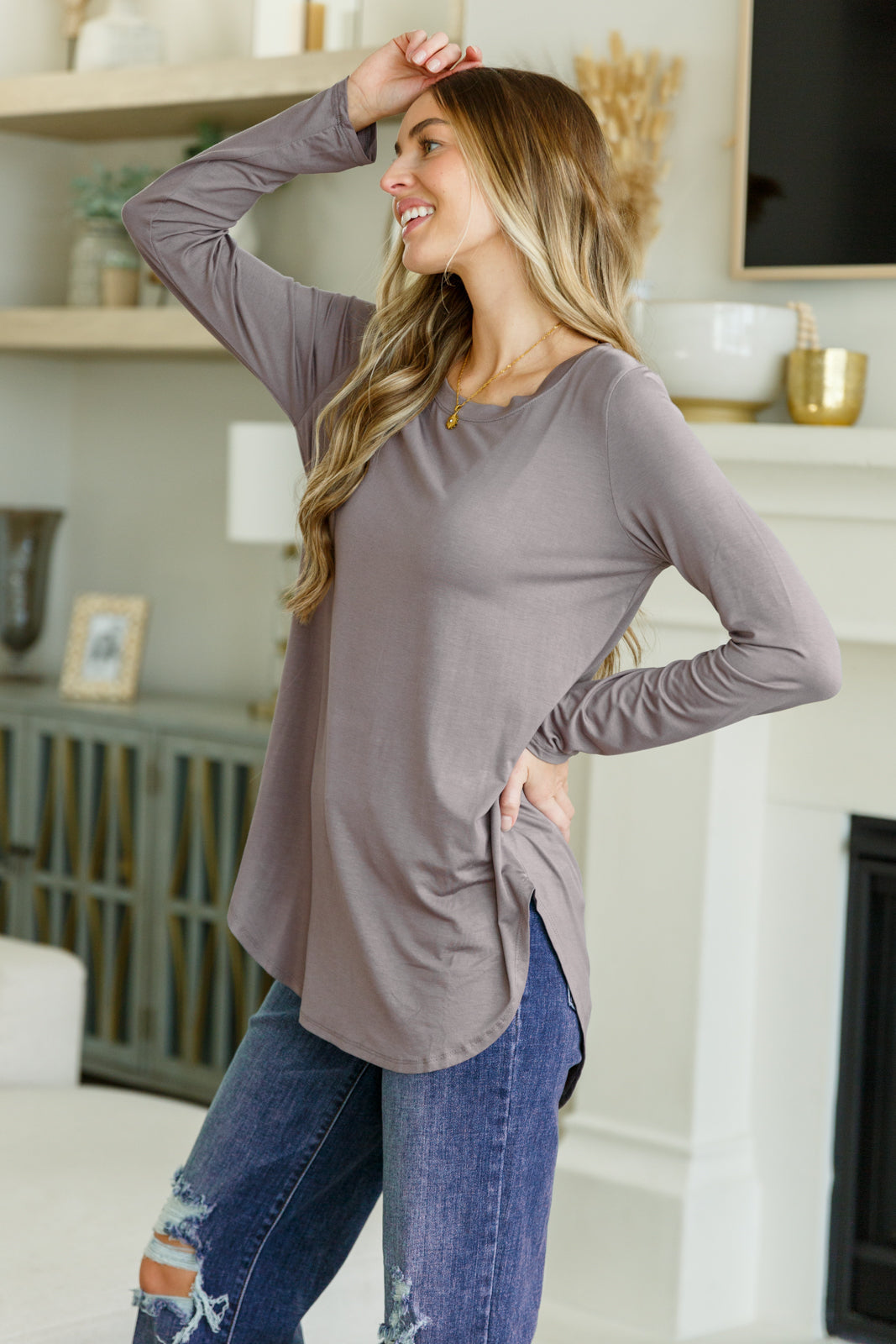 Indulge in self-care with our Me Time Long Sleeve Top! Made from brushed microfiber, it features a scoop hem and round neckline for added comfort. Its flowy fit is perfect for stylish max-comfort! Embrace the life of comfort and style with this top. S - 3X