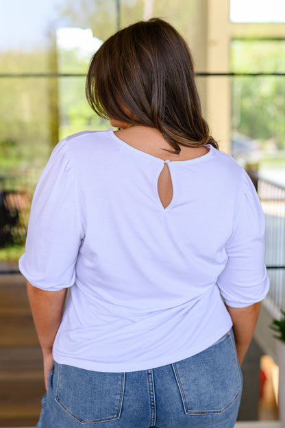 Look your best in the timelessly chic New Days Ahead White Blouse. Featuring a puff sleeve, a keyhole detail on the back, a classic white hue, and a comfortable jersey knit, this top is sure to be your new go-to for any occasion. S - 3X