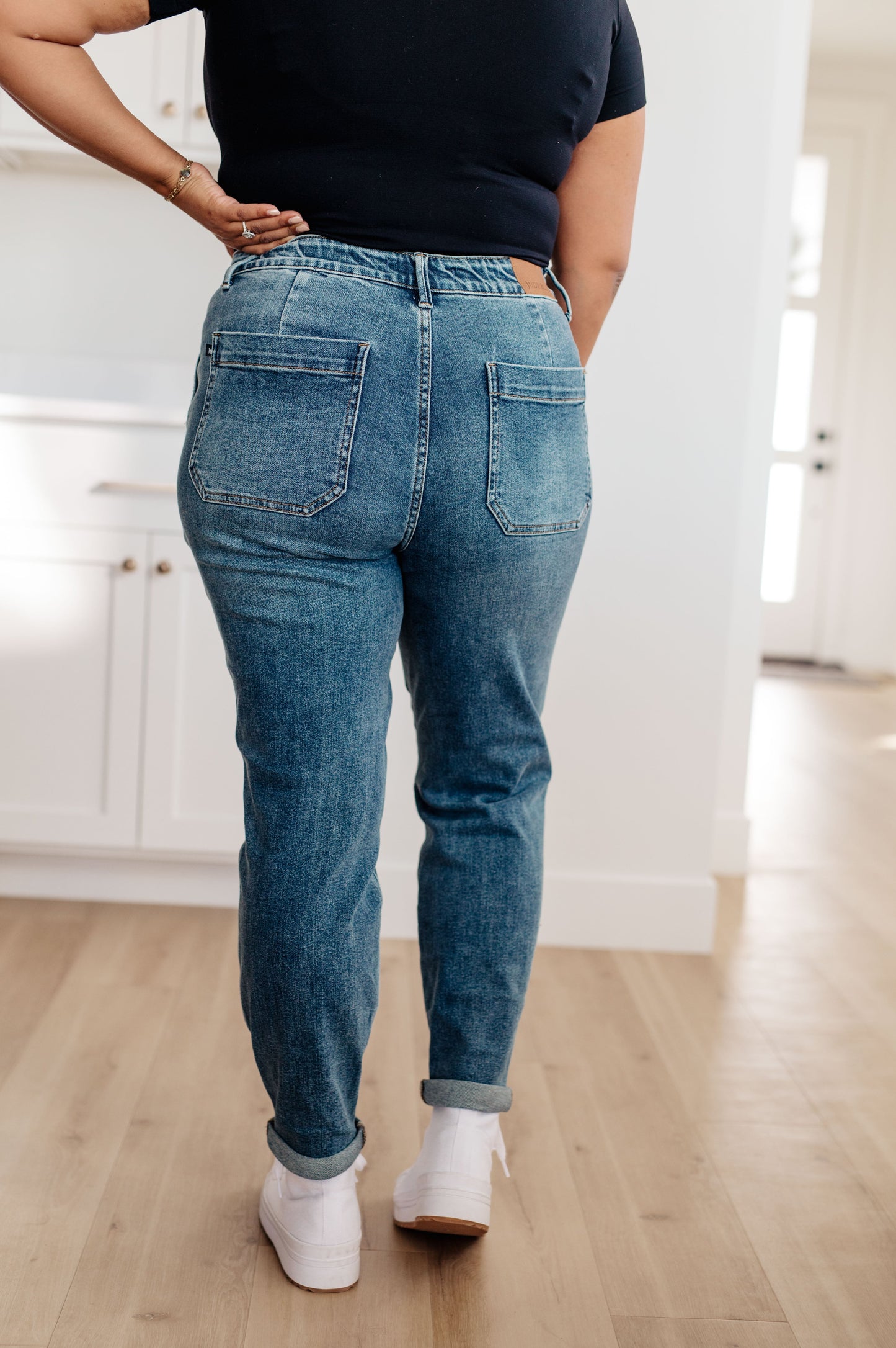 Experience the perfect fit and style in the Payton Pull-On Denim Joggers from Judy Blue! Made with a high rise and zero distressing, these medium-wash joggers offer an elastic waistband, functional drawstring, and patch pockets for a comfortable, adjustable fit. With an optional rolled cuff, you'll look and feel effortlessly chic. Are you ready to feel confident and stylish? Try Payton Pull-On Denim Joggers today! 0 -24W