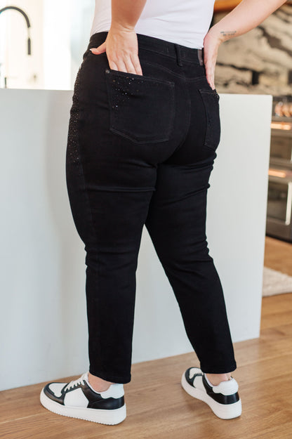 Unlock your unique style with Reese Rhinestone Slim Fit Jeans! Their high-rise fit and stretchy denim ensure comfort while the rhinestones add sophisticated flair. Bring out your inner sparkle and elevate your look! 0 -24W