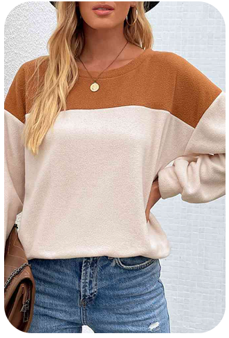 “Margaret” is a cream and camel color block fleece sweatshirt. Size medium.