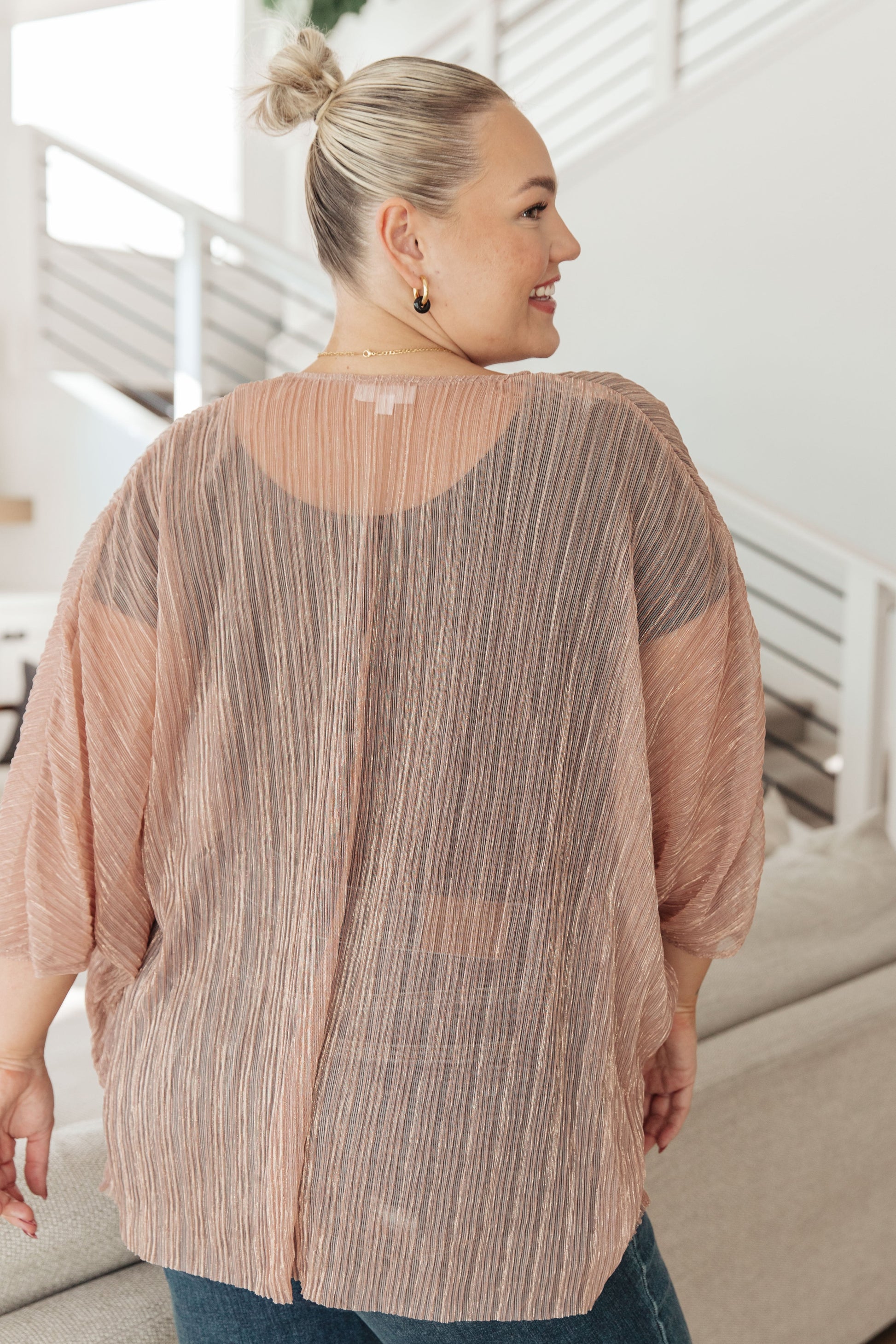 Perfect for party time, this Sheer Sign Kimono is crafted of sheer accordion fabric with lurex thread accents for a stunning shimmer. Its open front design and full-length silhouette will ensure you look your best for your next cocktail hour. S - 3X