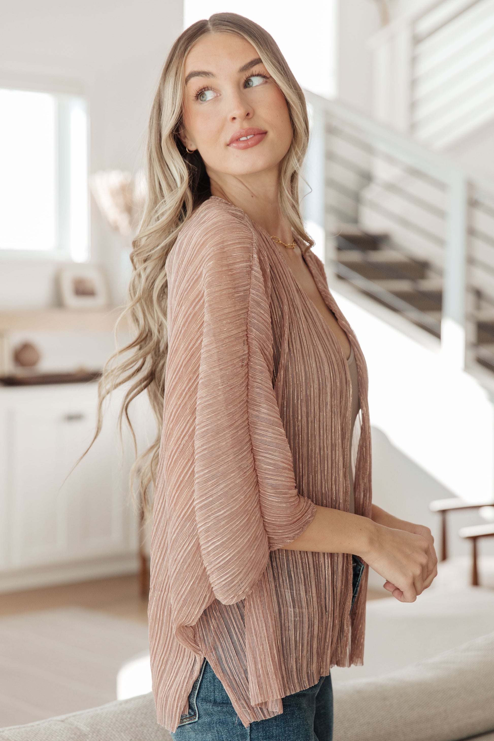 Perfect for party time, this Sheer Sign Kimono is crafted of sheer accordion fabric with lurex thread accents for a stunning shimmer. Its open front design and full-length silhouette will ensure you look your best for your next cocktail hour. S - 3X