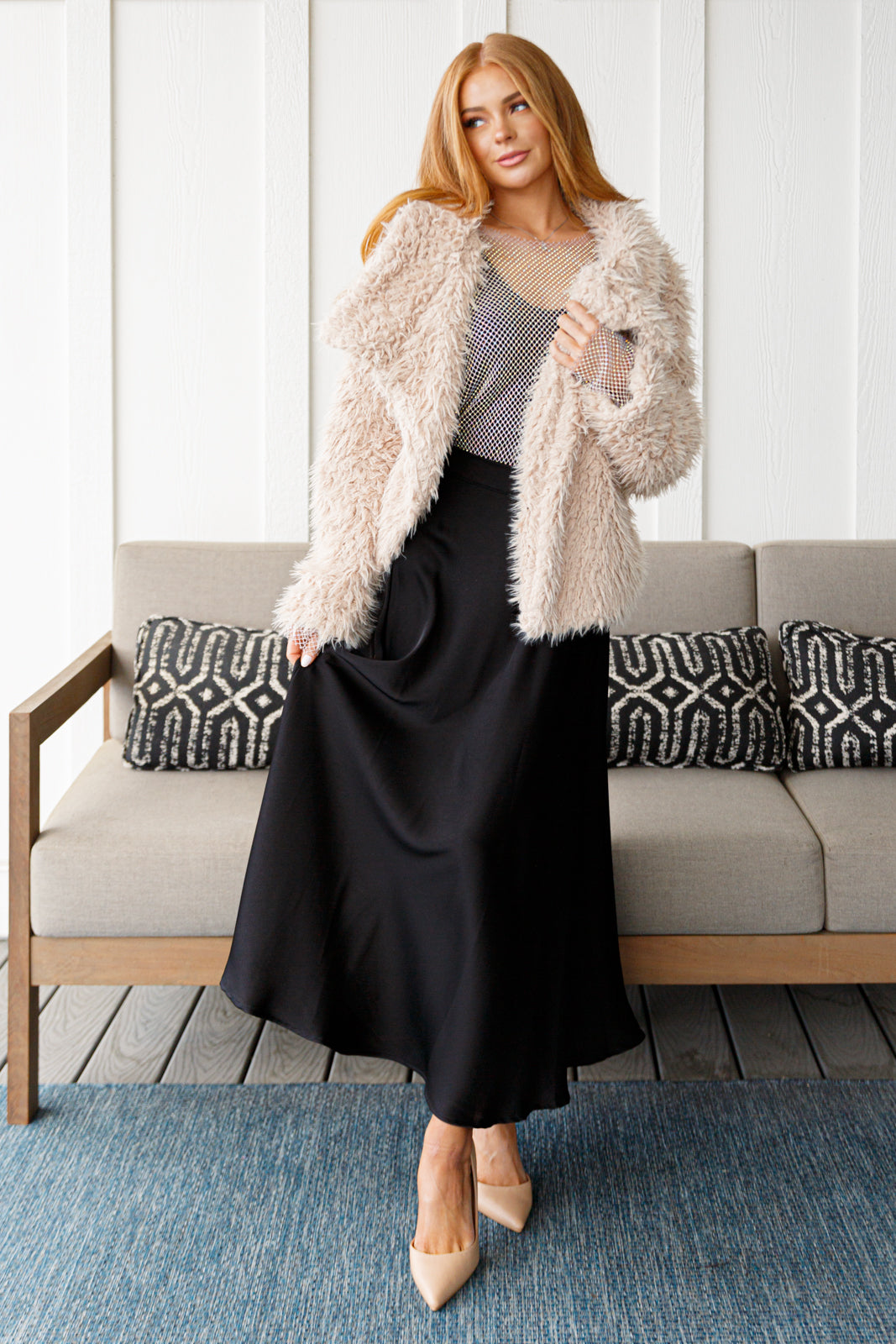 This Disco Queen Faux Fur Coat will make you shine on the dance floor! Its shaggy faux lambs fur, pockets, open front, and exaggerated fold over collar are sure to turn heads. This coat will keep you warm and stylish all night long! S - 3X