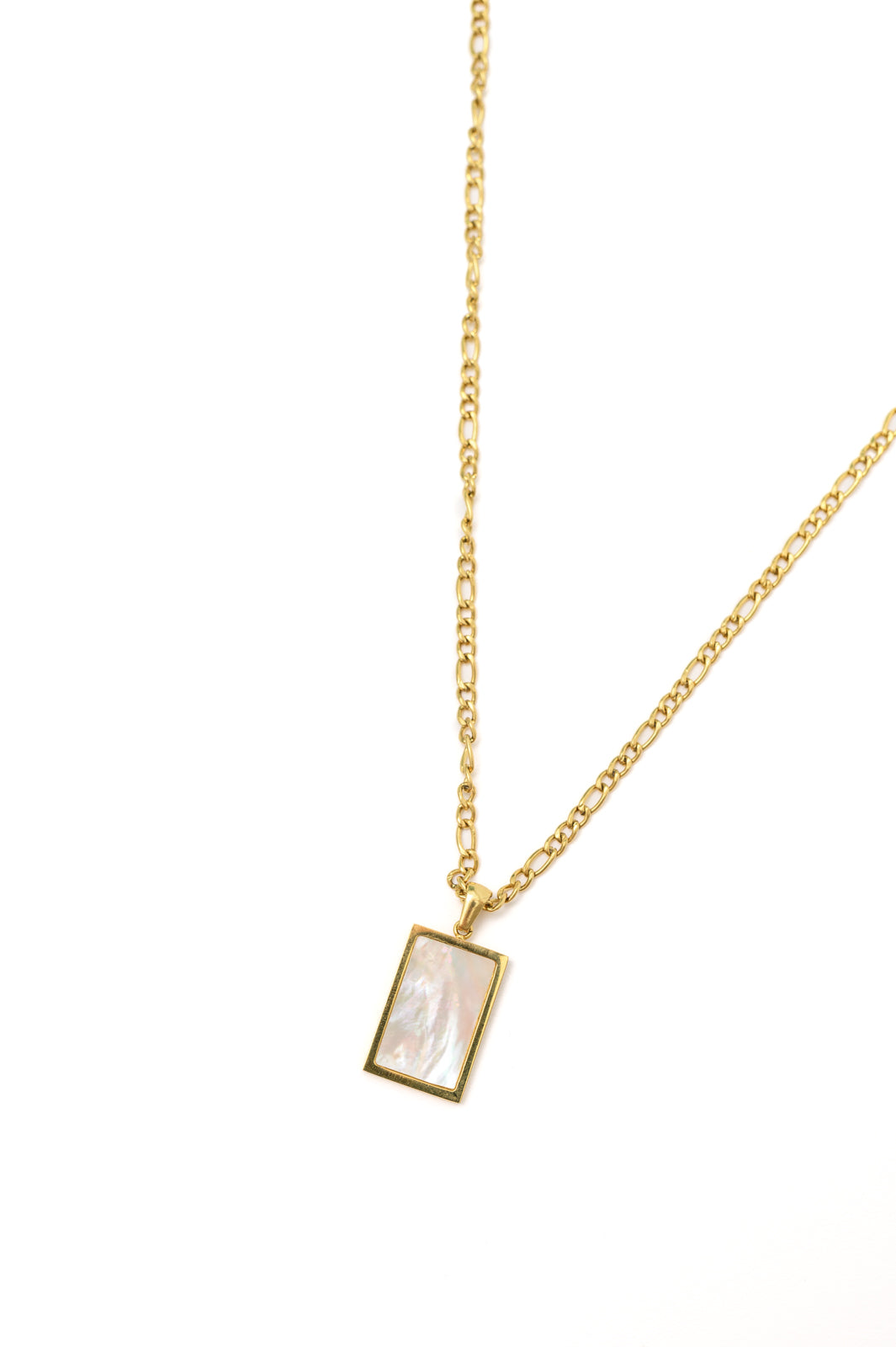 This Subtly Sweet Pendant Necklace is the perfect way to add a touch of glamour to any look. The 18k gold-plated link chain and rectangle shell pendant combine for a classic chic look that never goes out of style. Make a statement with this timeless piece!
