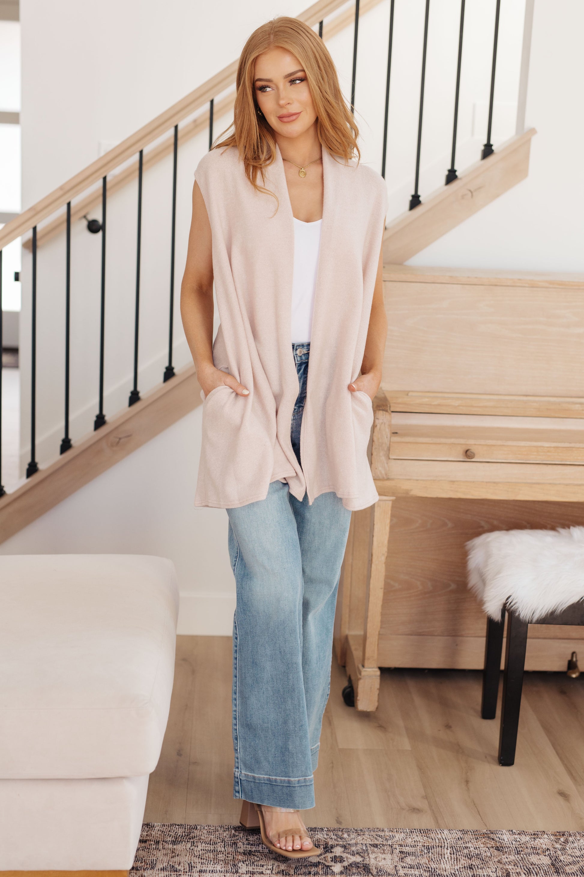 Layer your look with this Surely a Win Sleeveless Cardigan. Crafted from lightweight sweater knit with a shawl collar, it features a sleeveless, open front design with pockets for added convenience. Give any outfit a stylish finish with this cardigan! S - 3X