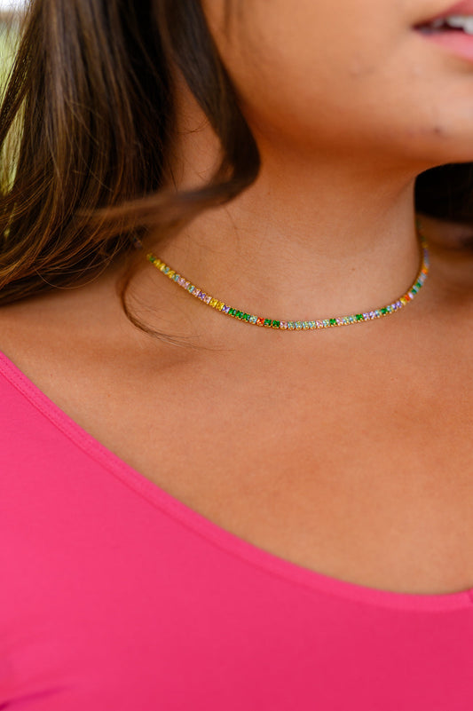 Make a statement with The Promise Tennis Necklace. This exquisite, timeless design is made with 18K gold and multicolored Cubic Zirconia stones for a truly dazzling look. Make a commitment to your style with The Promise Tennis Necklace - do you promise?  18K gold plated titanium steel means you can wear this piece to the beach, the pool, or even working out without worrying over tarnishing, green marks, or skin irritation.