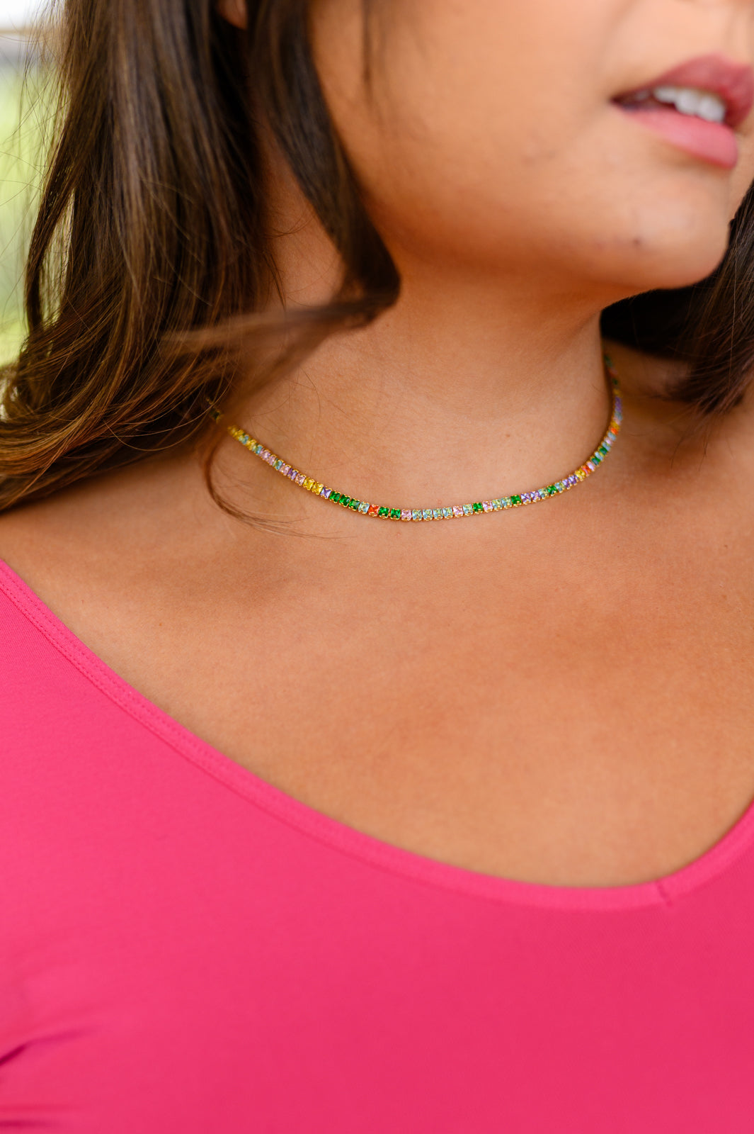 Make a statement with The Promise Tennis Necklace. This exquisite, timeless design is made with 18K gold and multicolored Cubic Zirconia stones for a truly dazzling look. Make a commitment to your style with The Promise Tennis Necklace - do you promise?  18K gold plated titanium steel means you can wear this piece to the beach, the pool, or even working out without worrying over tarnishing, green marks, or skin irritation.
