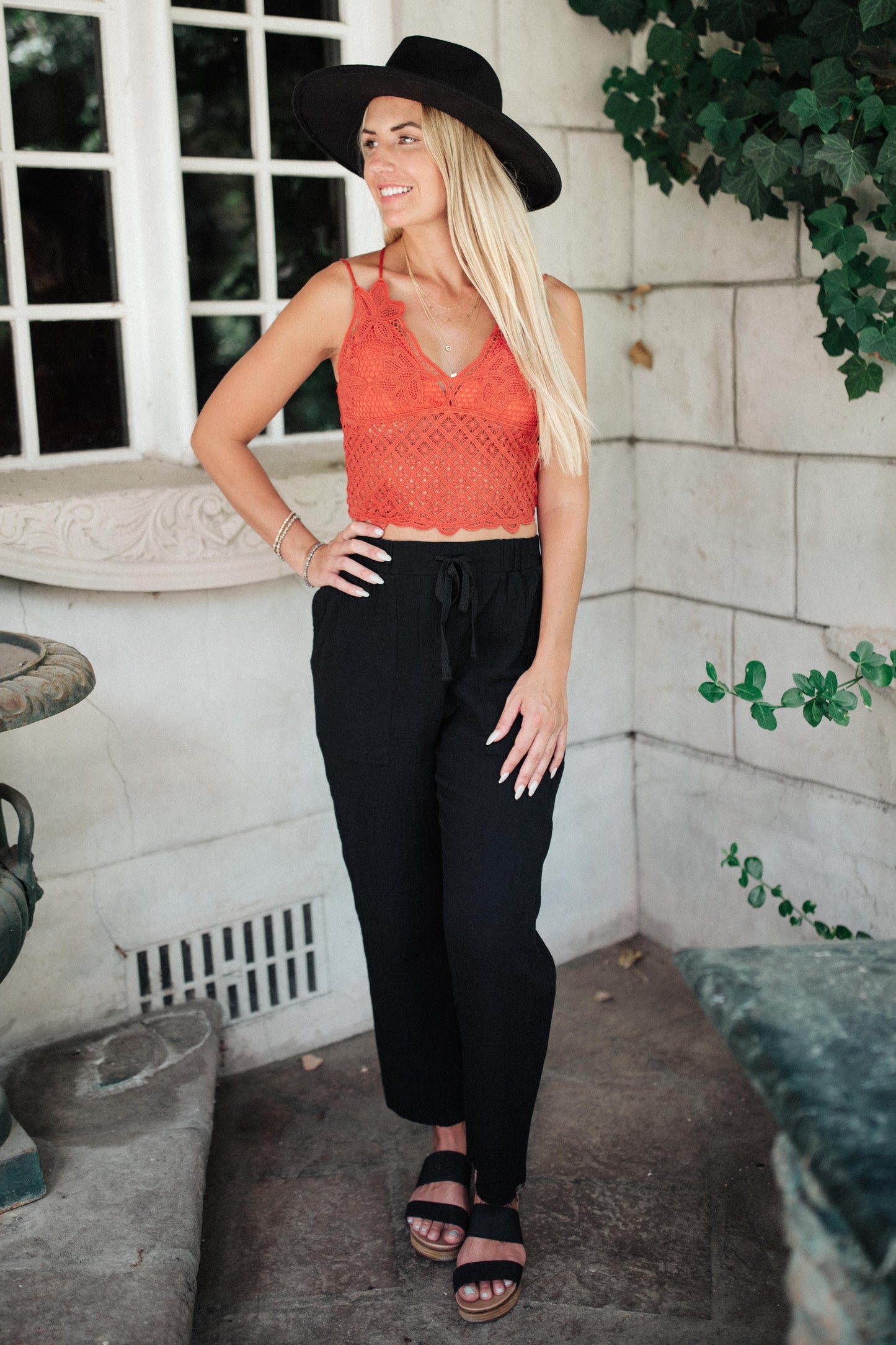 The Wild And Free Crop Top is a beautiful lace tank! We are obsessed with the dainty floral lace and double spaghetti strap. Pair this with shorts or a wide leg trouser for a flirty and feminine outfit. S - L