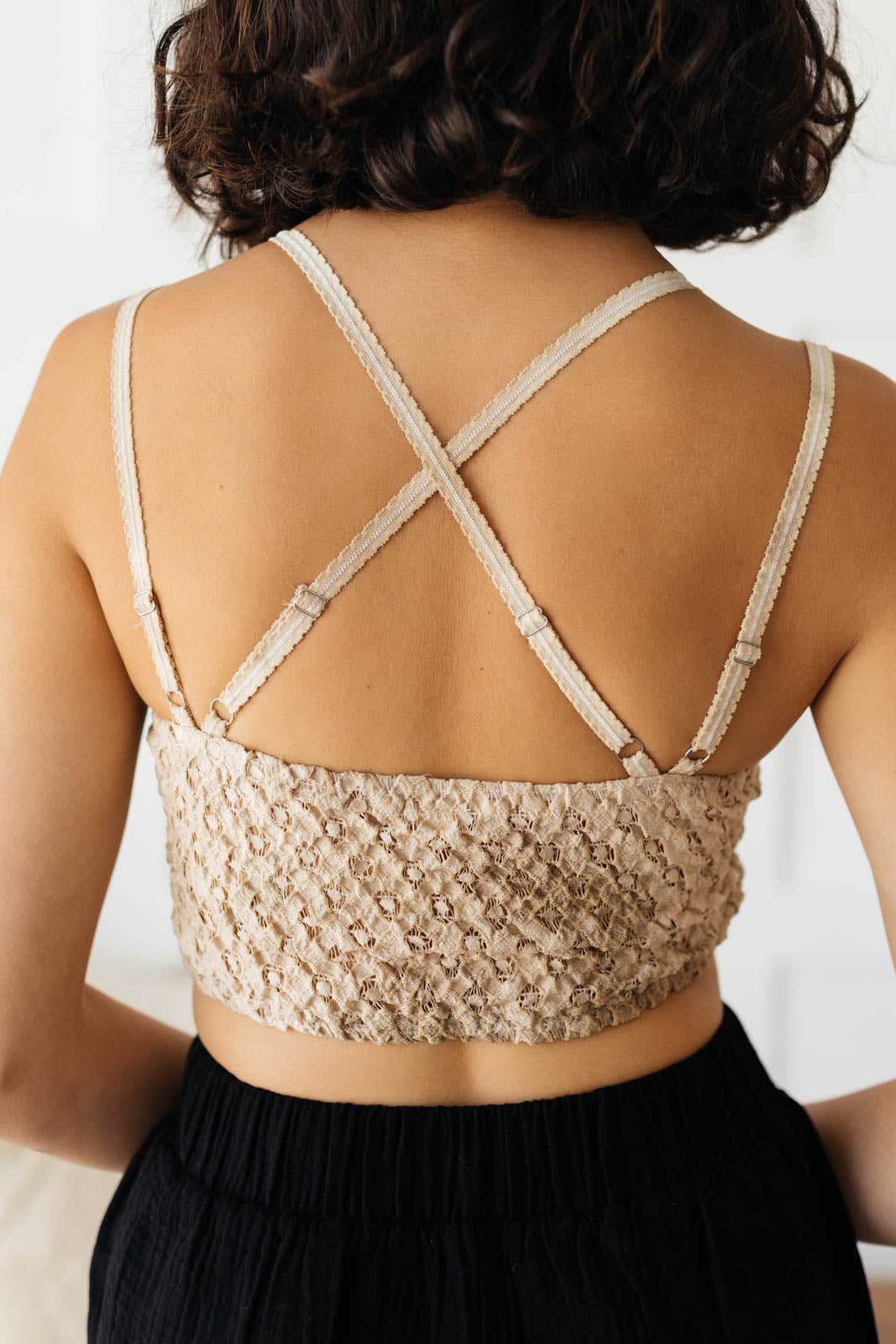 This beautiful lace bralette is perfect for layering. This lightweight, medium support bralette brings a feminine touch to any outfit. Pair it with a t-shirt or oversized sweater for a comfortable and flirty look! S - L