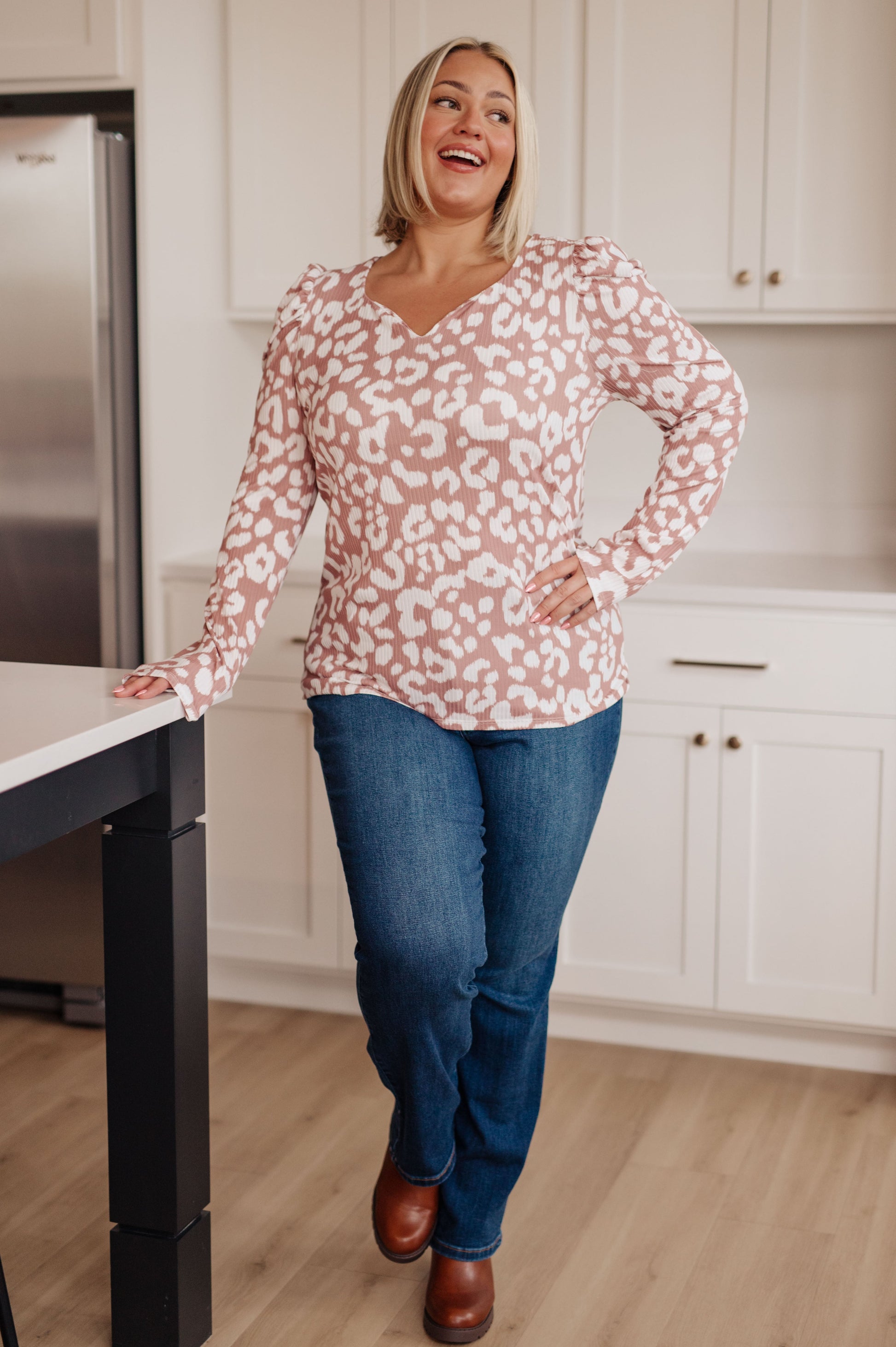 This Wild Weekend Animal Print Top lets you show off your wild side. Crafted from soft ribbed jersey knit, it features a sweetheart neckline and puff sleeves with a standout animal print. Have fun and stand out in this stylish top!