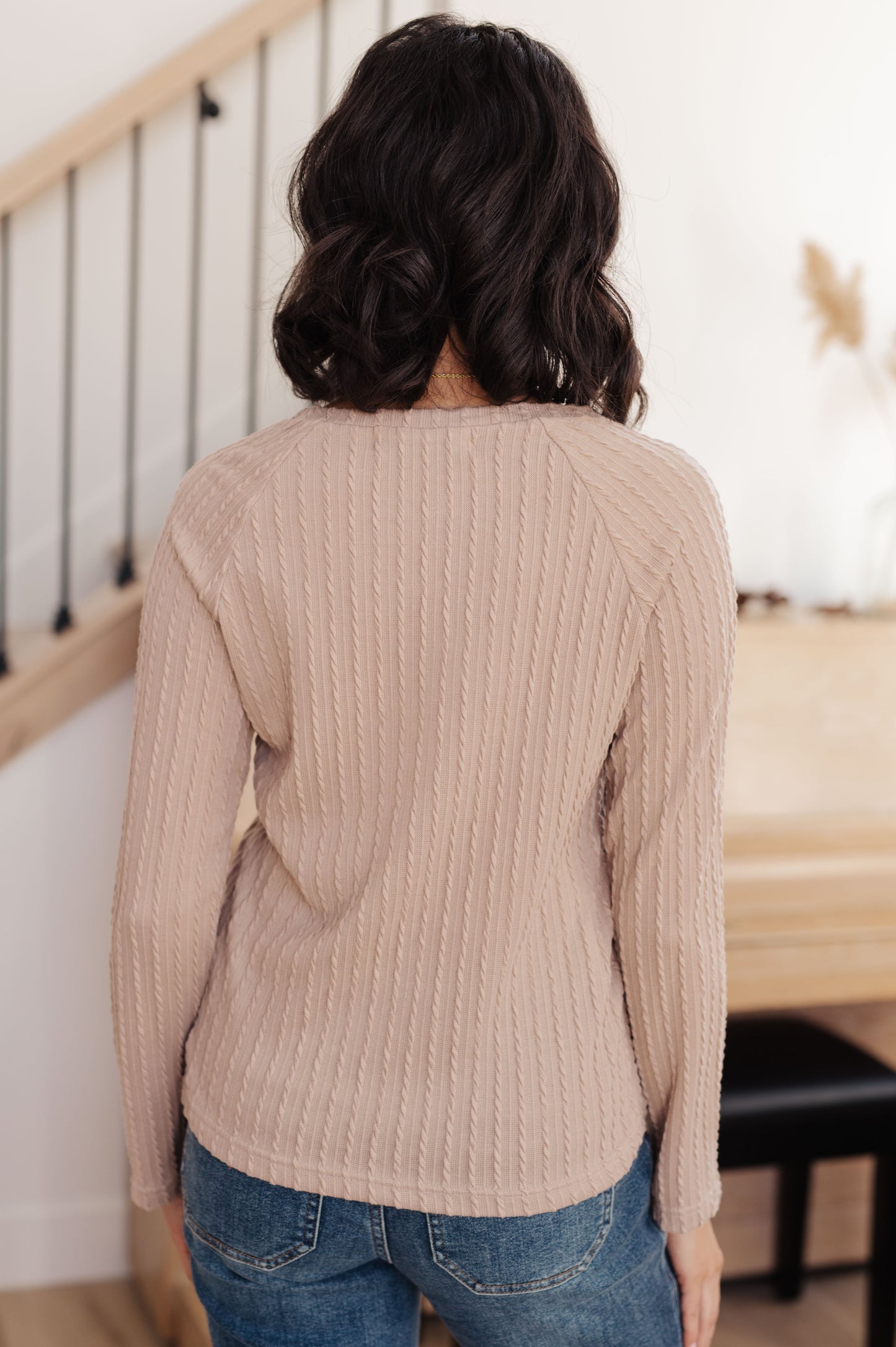 Soothe your senses in this Winding Down Cable Detail Top. A textured knit with raglan sleeves and round neckline will keep you feeling comfortable and stylish. Enjoy the luxurious softness of this timeless piece. S - 3X