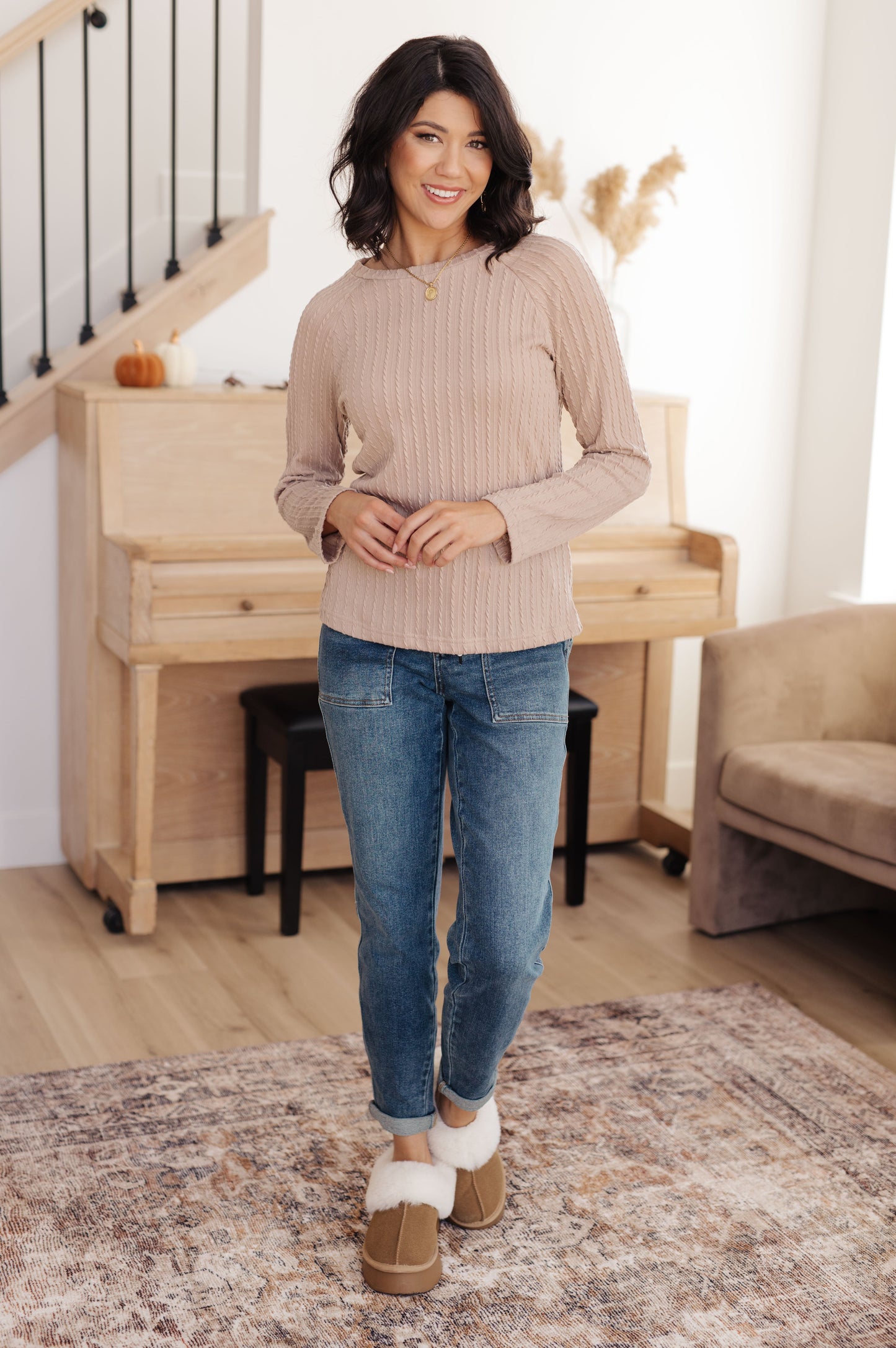 Soothe your senses in this Winding Down Cable Detail Top. A textured knit with raglan sleeves and round neckline will keep you feeling comfortable and stylish. Enjoy the luxurious softness of this timeless piece. S -3X