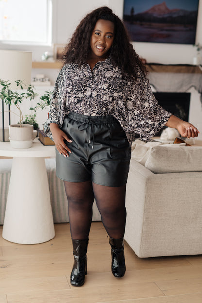 Make a statement with these Thought That Counts Faux Leather Shorts. Their vegan leather, high rise fit, and tulip hem create a modern and elevated style that will never go out of fashion. Look and feel your best while showing you care about what you wear. S - 3X