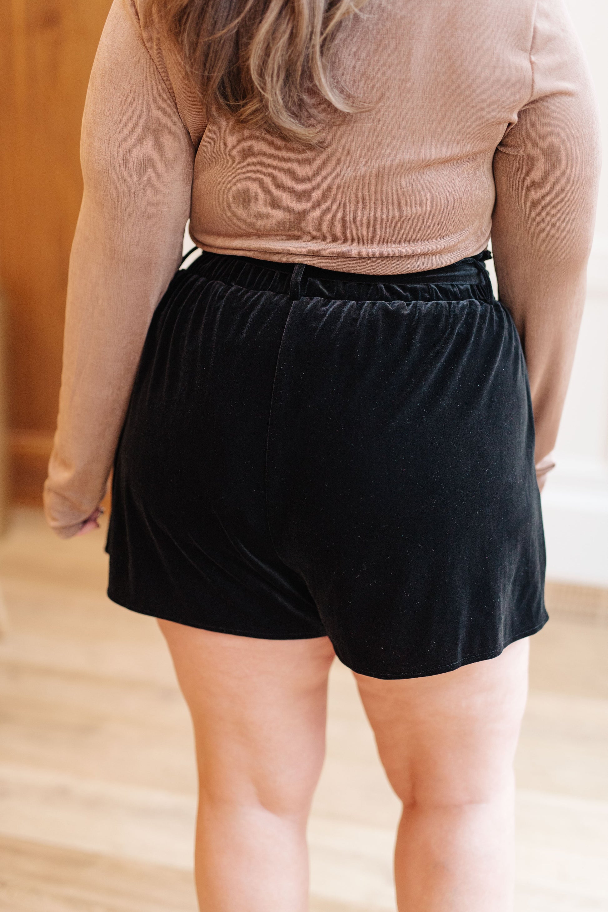 Fall in love with our luxurious Wrapped in Velvet Shorts! Featuring a high rise, these silky black velvet shorts have a gathered elastic paper bag waistband and self tie belt for an adjustable fit. Stylish pockets add the perfect touch. Feel confident and beautiful in these oh-so-comfy shorts! S - 3X