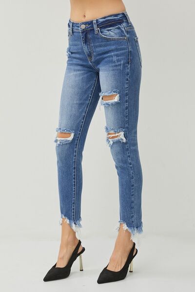 These Distressed Frayed Hem Slim Jeans are a must-have for anyone who loves a touch of edginess in their wardrobe. The distressed detailing adds a cool and rebellious vibe to these jeans, giving them a unique and trendy look. The slim fit design hugs your curves in all the right places, creating a flattering and stylish silhouette.