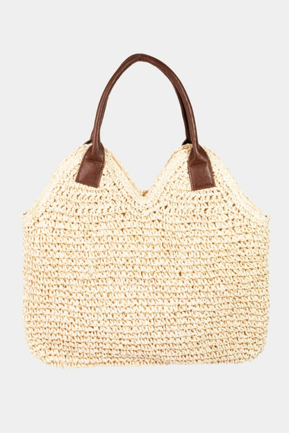 Straw Braided Faux Leather Strap Shoulder Bag is a stylish and trendy accessory that combines the natural aesthetic of straw with the sophistication of faux leather. The braided straw detailing adds a touch of bohemian charm, while the faux leather shoulder strap provides durability and a modern edge.
