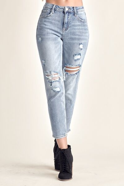The cropped length adds a modern and stylish twist, making them versatile for various outfit combinations. Made from high-quality denim, they offer both comfort and durability. These jeans can be easily dressed up with heels or dressed down with sneakers for any occasion. Whether you're going for a casual day look or a night out with friends, these distressed slim cropped jeans will effortlessly elevate your style.