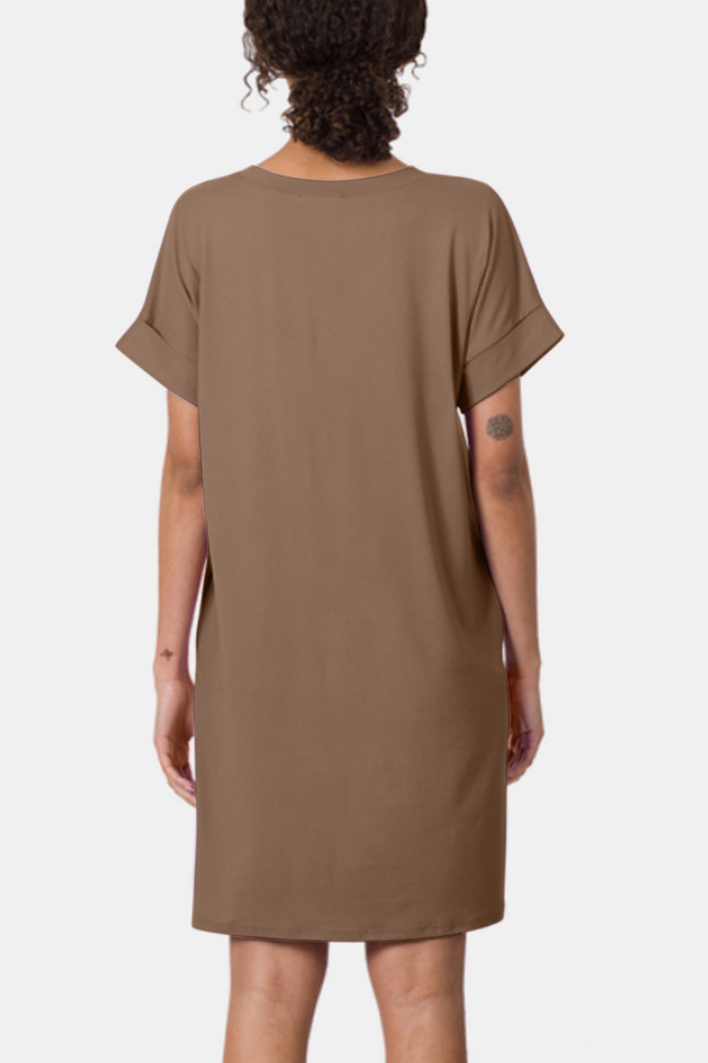 The rolled short sleeve V-neck dress is a versatile and stylish addition to your wardrobe. The V-neckline adds a touch of femininity and elegance, while the rolled short sleeves provide a casual and relaxed vibe.  S - XL